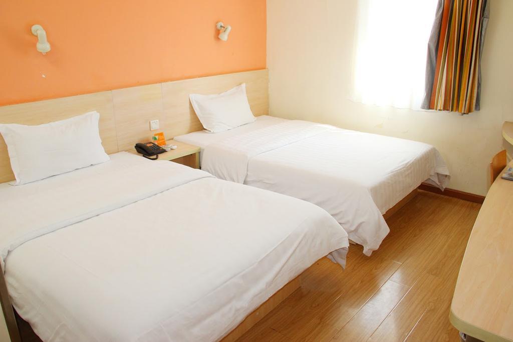 7Days Inn Qionghai Bus Station Bagian luar foto